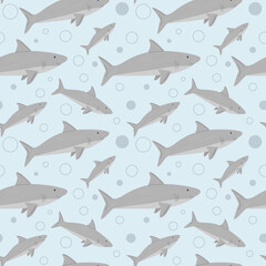 Vector seamless pattern with sharks in flat style. Suitable for decorating textiles and wrapping paper for children