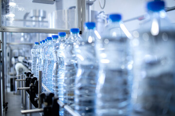 Water bottling factory - water production line and bottling pure clean water. Industrial machine...