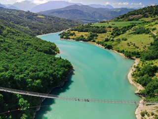 Obraz na płótnie Canvas Drac Himalayan footbridge, isère, France allows to span the Drac River , unique in Europe. Monteynard lake. Located near Grenoble city