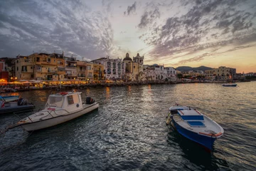 Foto auf Acrylglas Neapel Fishing boats moored at the colorful Ischia Ponte marina at sunset, Campania, Italy