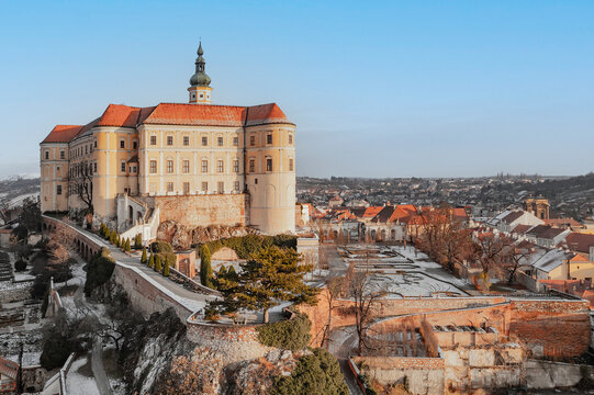 Aerial view of Zamek Mikulov castle, a baroque palace in wintertime with snow in Mikulov, Czech Republic.