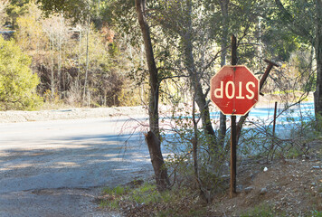 upside down stop sign on the road © Stephanie
