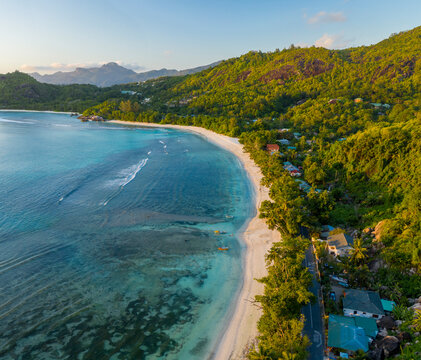 Aerial view of Baie Lazare beach along the coastline facing Lazare Bay, Takamaka, Seychelles.