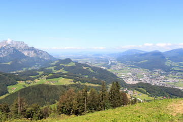 Panorama view from alpine mountain Zinkenkogel towards City Hallein and blue sky in Salzburgerland,...