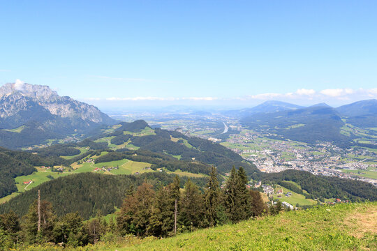 Panorama view from alpine mountain Zinkenkogel towards City Hallein and blue sky in Salzburgerland, Austria