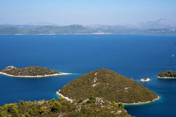 Fototapeta na wymiar View of the sea, islands and clouds in southern Croatia