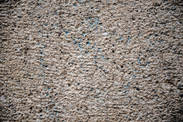 A white wall structure with blue dots in it