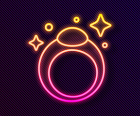 Glowing neon line Fantasy magic stone ring with gem icon isolated on black background. Vector