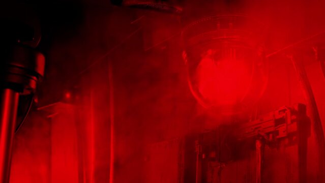 Red Alert Light Flashing With Lots Of Steam Being Released