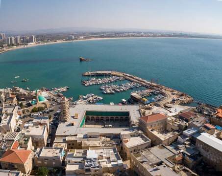 Aerial view of old acre harbor and the Khan of the Pillars building, Old City of Acre, Israel.