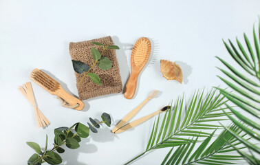 Fototapeta na wymiar Set of eco friendly body care items, bamboo toothbrushes, wooden massage brushes and combs, natural washcloths, spa and wellness composition, mockup, healthy lifestyle concept, zero waste. no plastic