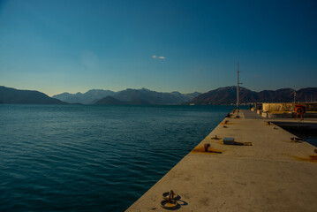 MARMARIS, TURKEY: View from the Marmaris promenade to the sea and mountains in the snow in winter.
