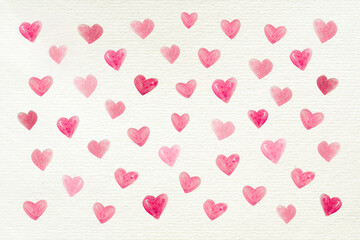 Love background with many watercolor hearts painted on a recycled white paper for Valentine's Day or other celebrations, letter, copy space