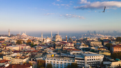Top view of the beautiful cityscape of Istanbul, parts of Asian Turkey (Anatolia) from European Turkey at sunny day. Aerial view of Istanbul on sunset