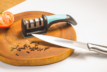 Reversible manual knife sharpener. Close-up subject.