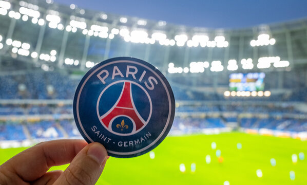 August 30, 2021, Paris, France. The emblem of the football club Paris Saint-Germain F.C. against the backdrop of a modern stadium.