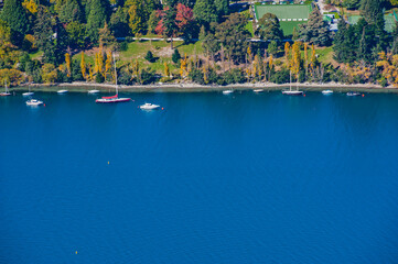 Fototapeta na wymiar Boats moored up in Queenstown Harbour, South Island, New Zealand