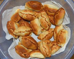 Traditional Russian baked patties in deep bowl.