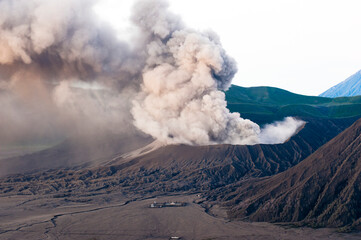 Mount Bromo Erupting at Sunrise Sending Ash Clouds High into the Sky, East Java, Indonesia, Asia