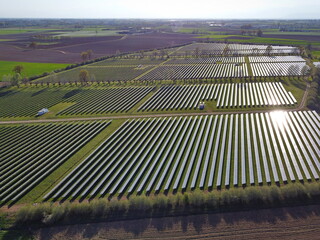 Drone Aerial View power station producing clean, sustainable solar energy  in Italy