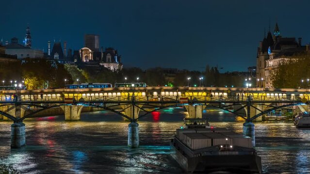 Historic Bridges in Paris at Night With Boats Traffic on Seine River Lights Reflections Architecture