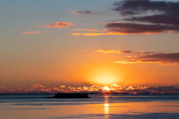 Fototapeta premium A colorful sunrise over Apalachicola Bay, Florida.