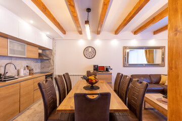 Kitchen interior and dining area in modern new mountain apartment