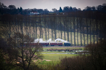Kent and East Sussex Railway steam train seen from Bodiam Castle, East Sussex, England, United...
