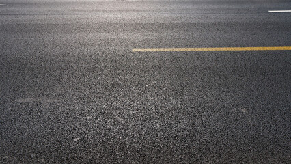 Fototapeta premium Asphalt pavement in the sun light.