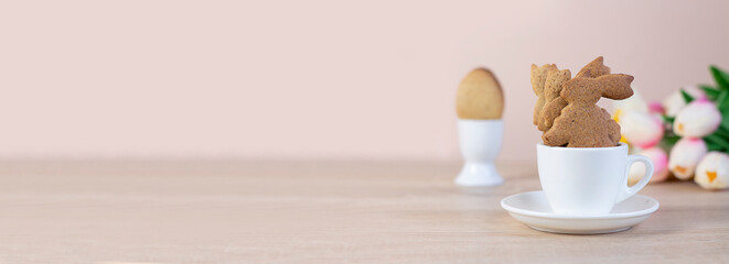 Easter background. happy easter card. Easter eggs. Easter. Rabbits in a cup. Banner. copy space