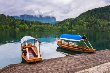 Traditional Pletna rowing boats, Bled, Gorenjska, Upper Carniola Region, Slovenia, Europe