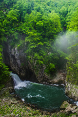 Skocjan Caves, Slovenia. Waterfall at the bottom of the 'Big Valley' (Velika Dolina), Karst Region of Slovenia, Europe