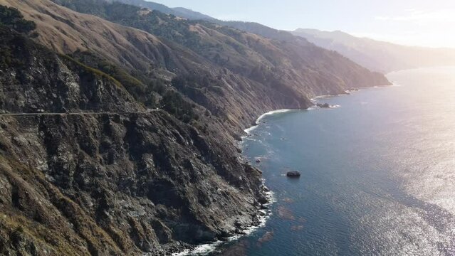 Aerial shot of the rugged coastline along the Pacific Coast Highway in California