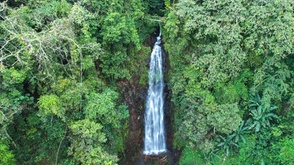 A beautiful view of a waterfall in the tropical forest in Saint Thomas and Prince, Africa