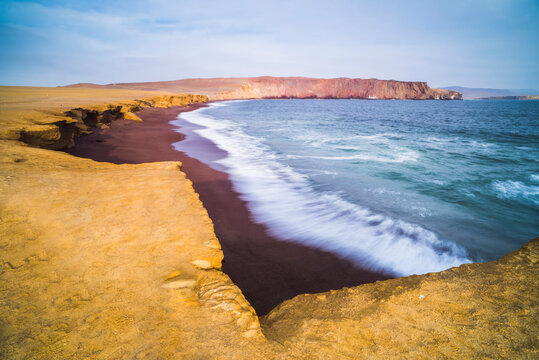 Desert directly meeting the sea (Pacific Ocean), Paracas National Reserve (Reserva Nacional de Paracas), Ica, Peru, South America