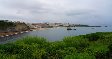 Fototapeta na wymiar Landscape view of La Grande Plage beach and the resort town of Biarritz in the Basque Country, France