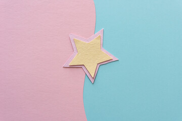 star on pink and blue paper
