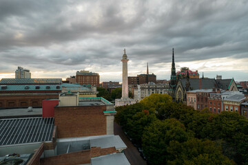 Aerial Drone View of Washington Monument in Baltimore City at Sunset on a Cloudy day