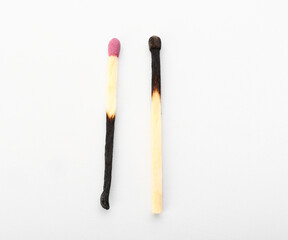 Burnt out matchsticks on white background. Emotional burnout concept