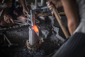 Metal workers at a blacksmiths, Inle Lake, Shan State, Myanmar (Burma)
