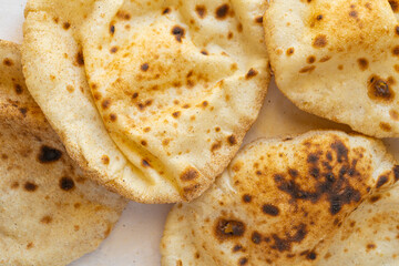 Egyptian Arab flatbreads - Aish Baladi top view. Close-up of Arabic tortilla
