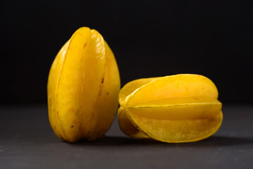 Star fruit on black background. Organic fruit from Thai farmer in local market