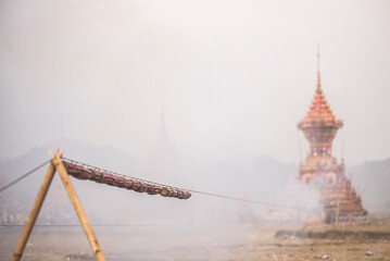 Mrauk U, firing a rocket at a monks coffin at Dung Bwe Festival, Rakhine State, Myanmar (Burma)