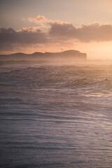 Fototapeta premium Sunrise at Vik Beach, South Region (Sudurland), Iceland, Europe, background with copy space