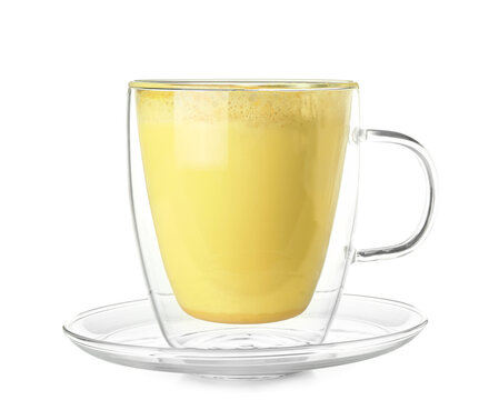 Glass cup of tasty turmeric latte on white background