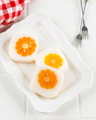 Selected Focus Milk Pudding with Fresh Orange at the Center