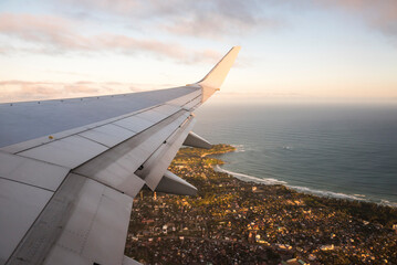 View of airplane wing at sunset, Madagascar, Africa