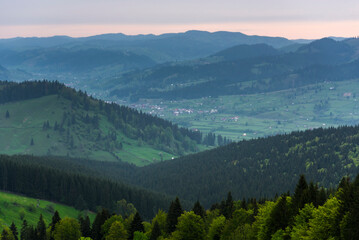 Fototapeta premium Bukovina Region (Bucovina) landscape at sunrise, Paltinu, Romania