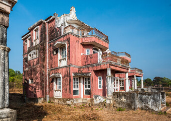Ruins of Abandoned, derelict old buildings of a Hotel Complex at Agonda, broken, damaged and ruined, Goa, India - obrazy, fototapety, plakaty