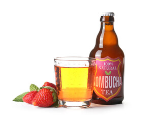 Bottle and glass of tasty strawberry kombucha on white background